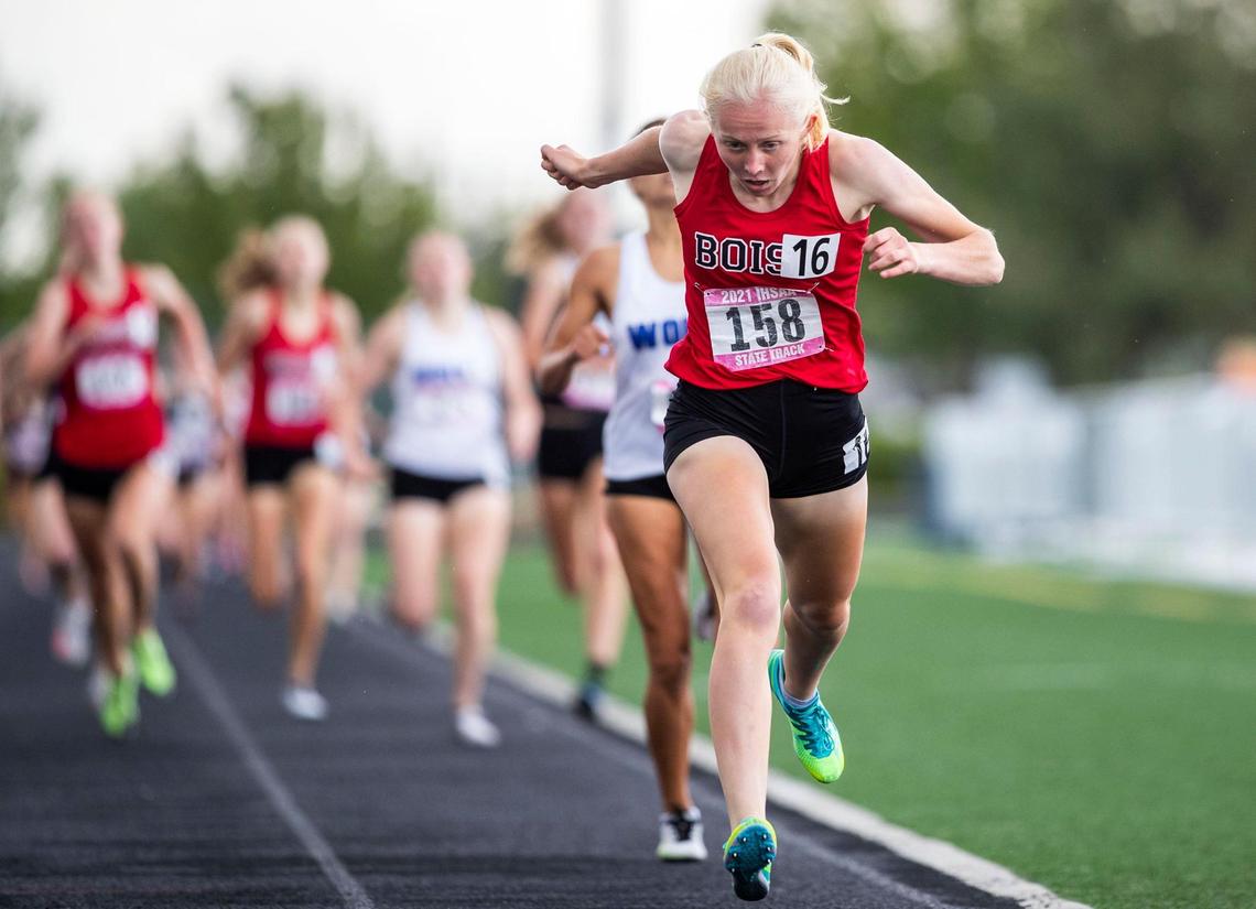 Boise High’s Logan Smith lunges across the 800-meter finish line, adding to the Boise girls dominance in the 5A state track finals Saturday, May 22, 2021, at Eagle High School.