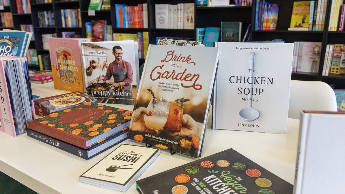 Books are on display at Cooks and Books in Meridian, Wednesday, Nov. 26, 2025. Cooks and Books is a new bookstore that features a curated selection of cookbooks and as well as offering cooking classes and book clubs.