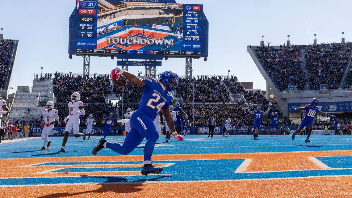 Boise State running back Dylan Riley glides through the end zone after a 49-yard touchdown run against UNLV on Saturday afternoon at Albertsons Stadium.