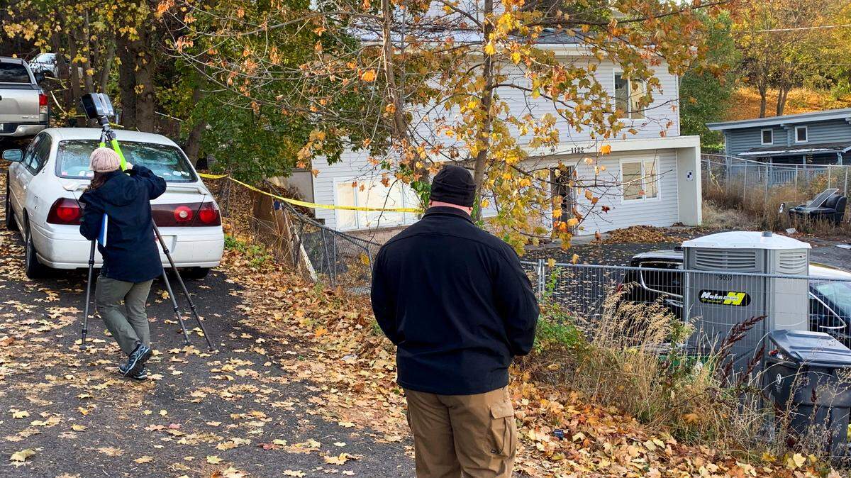 A survey team takes measurements and images, including with drones overhead, of the off-campus King Road home where four University of Idaho students were killed in November 2022. The University of Idaho, which now owns the property, provided new access to prosecutors in the Bryan Kohberger capital murder case andthe FBI, to build visual and audio exhibits and a physical model of the home, on Oct. 31, 2023 in Moscow, Idaho.