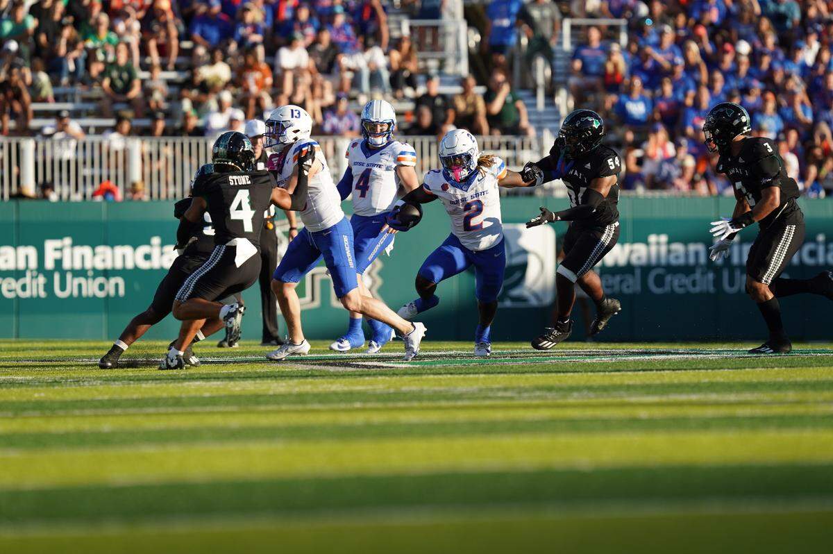 Ashton Jeanty escapes defenders early on in Boise State’s 28-7 victory over Hawaii on Saturday, Oct. 12, 2024.