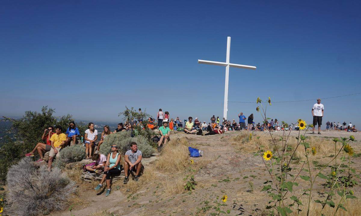 People gathered at the Table Rock cross to watch an eclipse in August 2017.