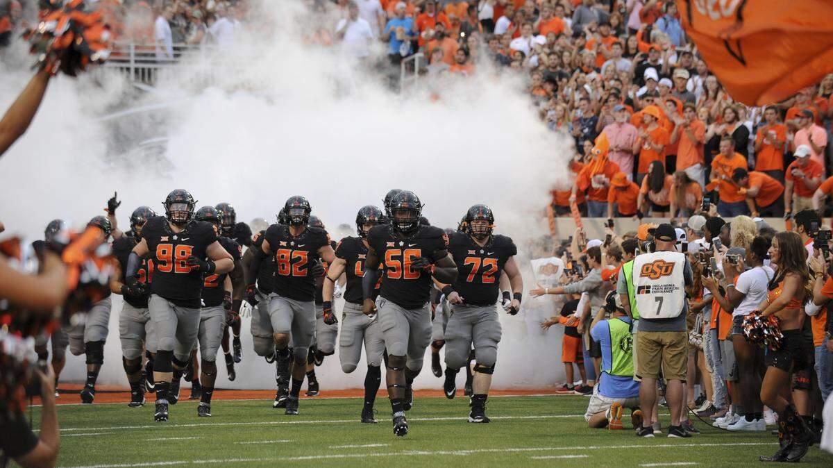 Boise State will play a regular-season game at a Big 12 team for the first time Saturday when the Broncos visit the Oklahoma State Cowboys.