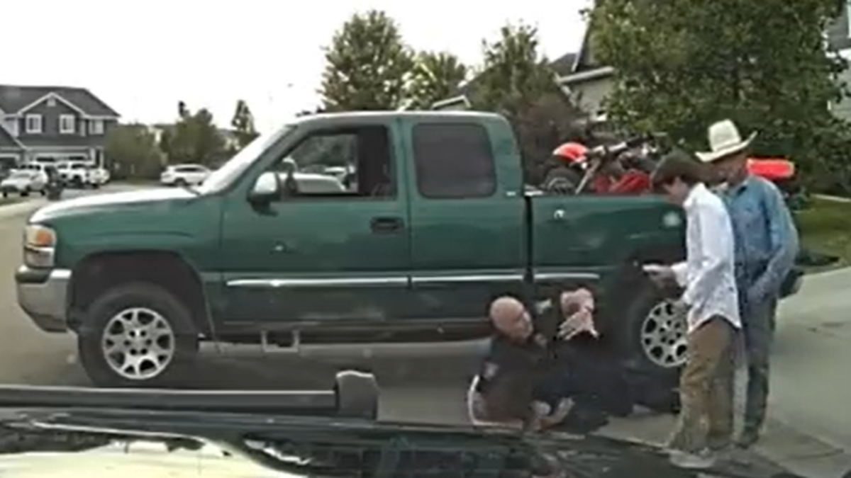 As Meridian Police Officer Bradley Chambers subdues Samson Allen, 21, he directs younger brothers Jacks, 14, and Gannon, 18, who are videotaping the moment, to move away.