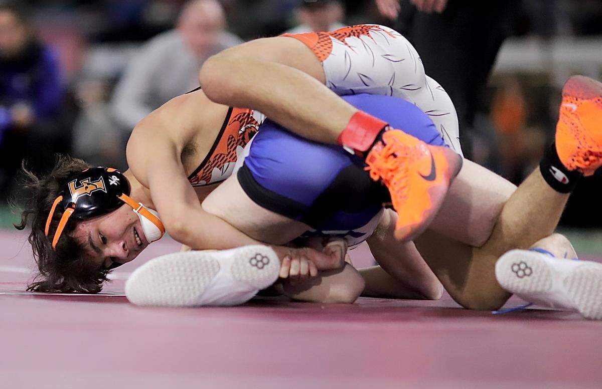 Fruitland’s Marcus Aleman, top, returns looking for his second straight state title this weekend. 