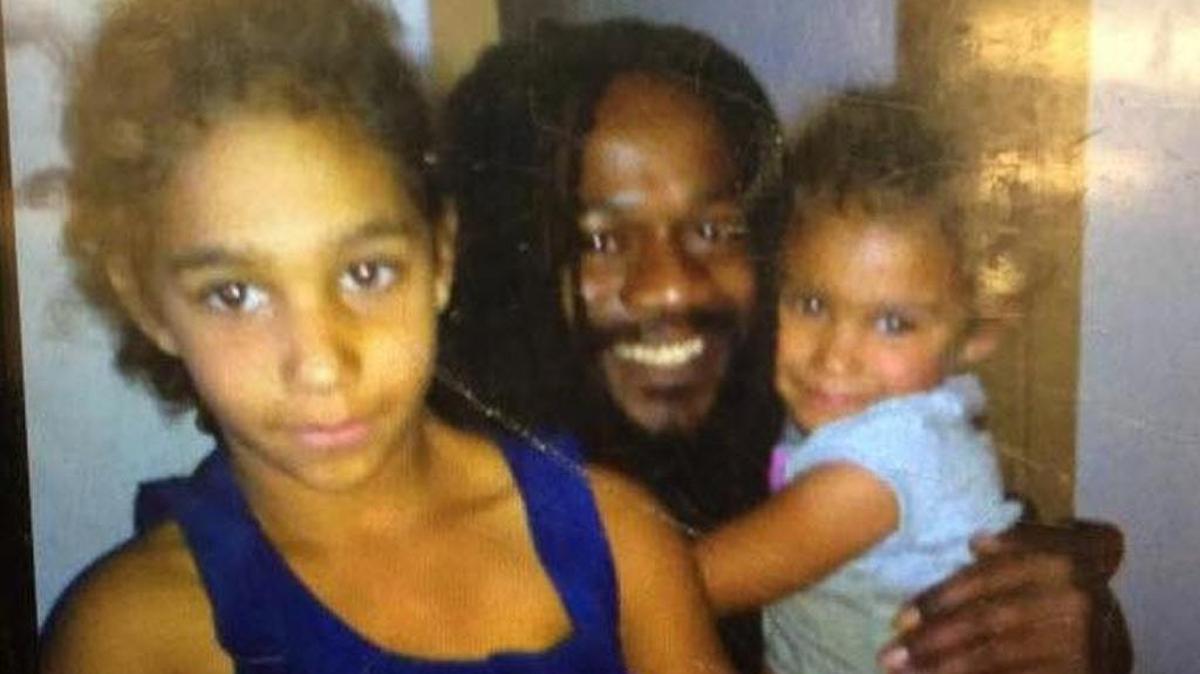 David Lee Fuller with Jazmyn Campbell, left, and Chandra Campbell.