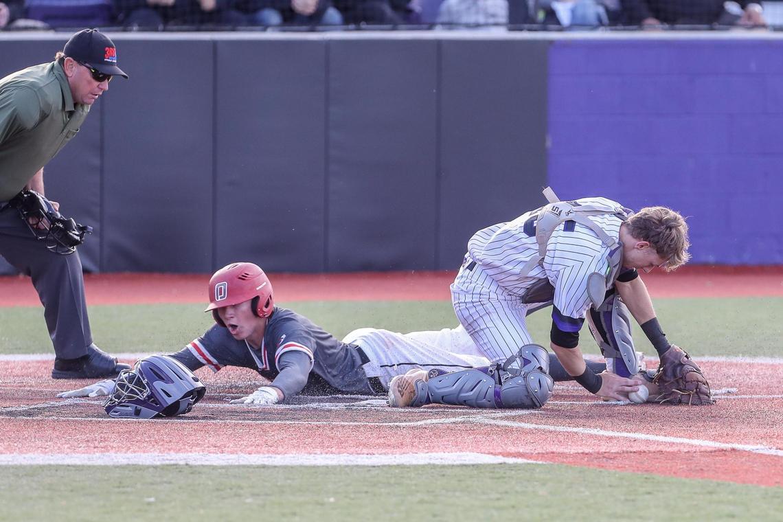 Owyhee’s Jack Ryan slides safely into home during the second inning Saturday during the 5A state championship game.