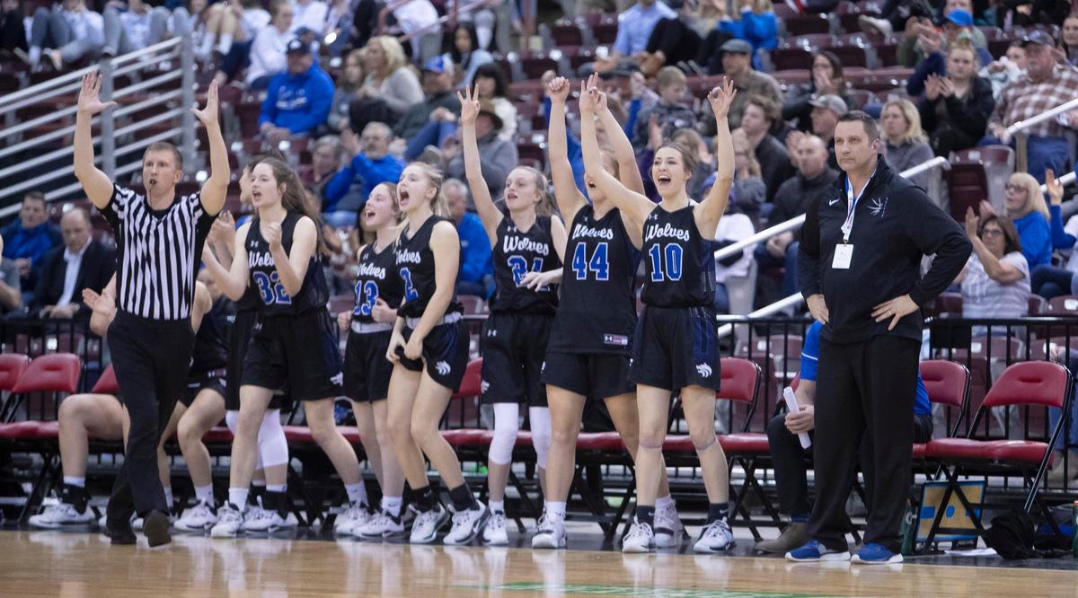 Timberline’s bench celebrates a 3-pointer by teammate Ava Ranson, giving the Wolves some breathing room against Rocky Mountain in the 5A state girls basketball tournament semifinals Friday, Feb. 21, 2020 at Ford Idaho Center in Nampa.
