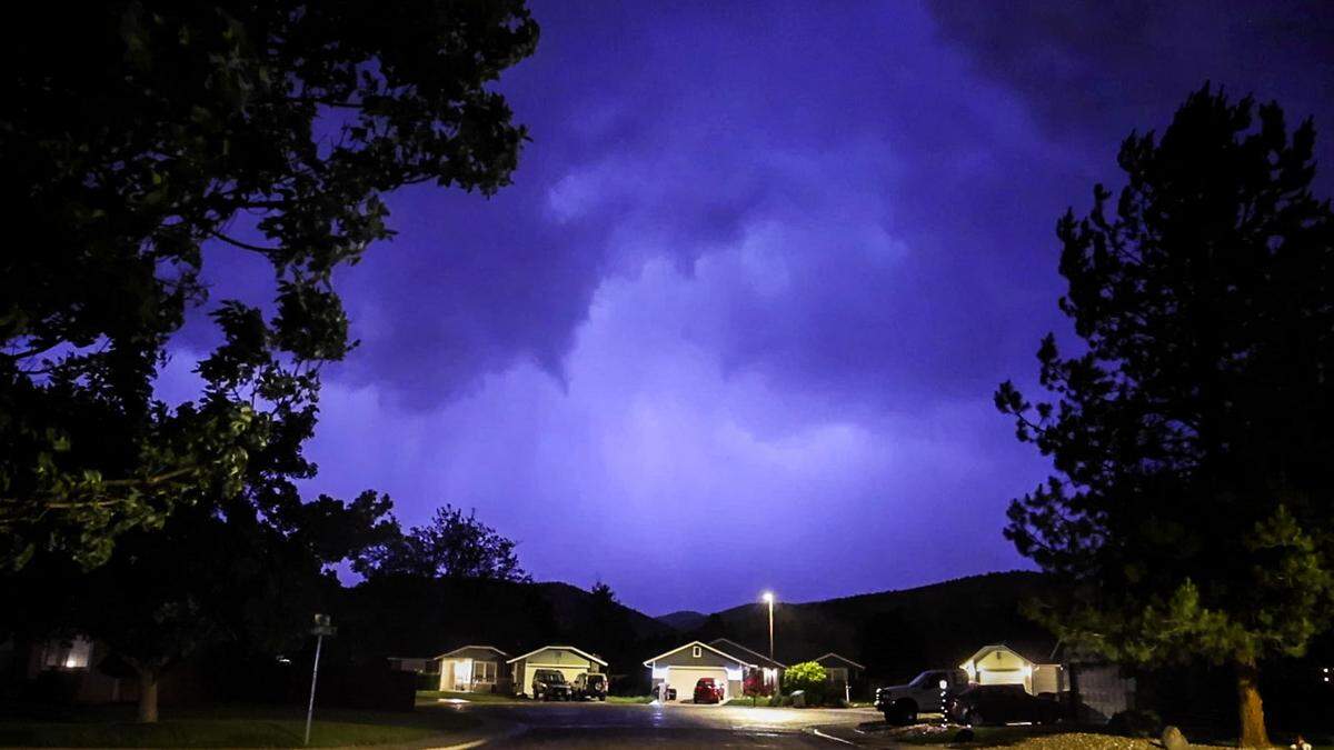A thunderstorm passing through the Boise area creates a rapid lightning show mixed with heavy rain in June 2023.