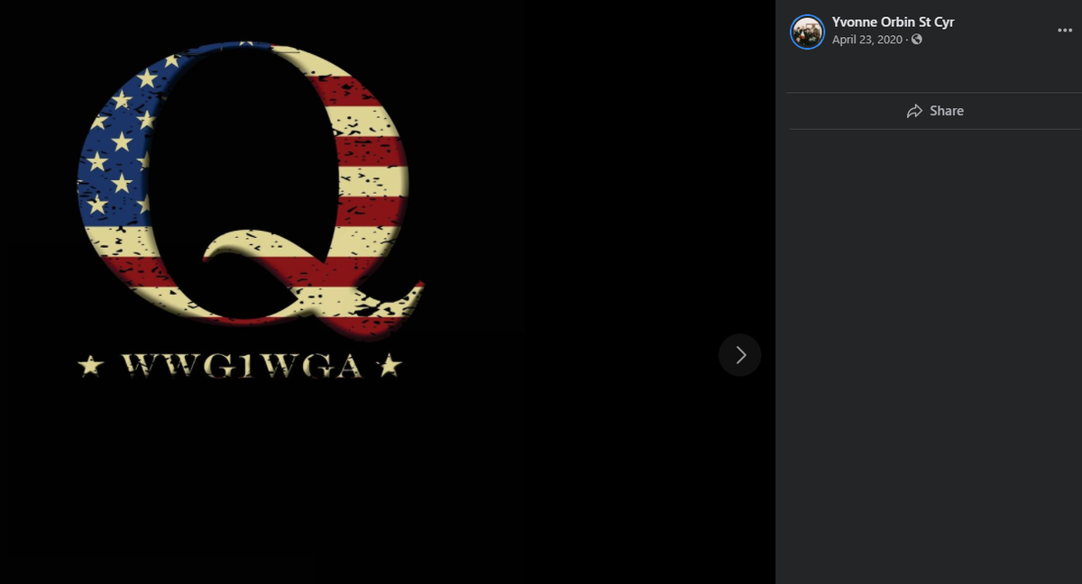 A screenshot taken from the Facebook page of Yvonne St Cyr shows a “Q” and the “WWG1WGA” slogan used by followers of the QAnon conspiracy theory.