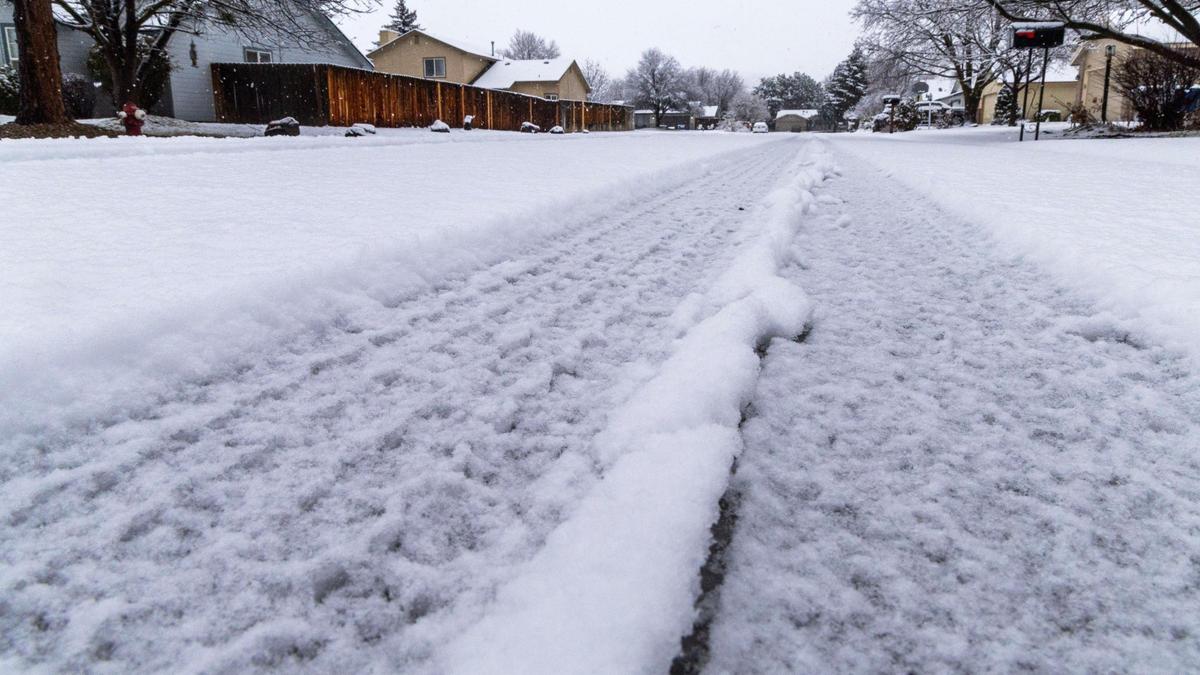 A blanket of snow greeted commuters Monday morning in Boise and surrounding communities. Weather forecasts indicate a mix of snow and rain through the week.