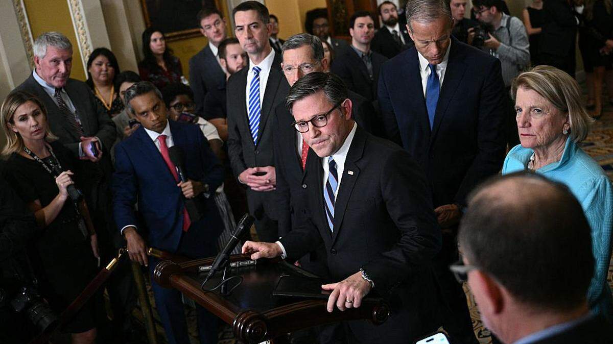 US Speaker of the House Mike Johnson (C), Republican from Louisiana, joins Senate Republican leadership during a news conference following a meeting with Senate Republicans at the US Capitol on the seventh day of the US government shutdown in Washington, DC on October 7, 2025. The US government shutdown entered its second week on October 6, 2025, with no sign of a deal between President Donald Trump's Republicans and Democrats to end the crisis. Democrats are refusing to provide the handful of votes the ruling Republicans need to reopen federal departments unless the two sides can agree on extending expiring "Obamacare" health care subsidies. (Photo by Brendan SMIALOWSKI / AFP) (Photo by BRENDAN SMIALOWSKI/AFP via Getty Images)          