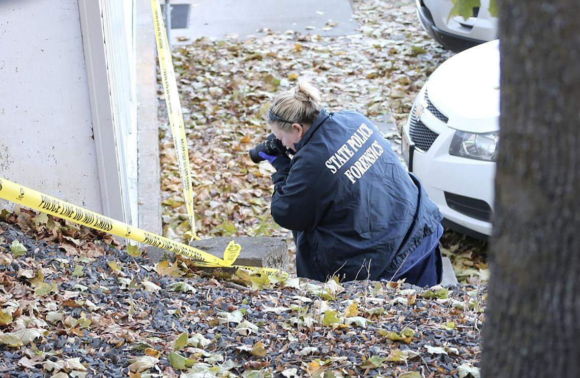 Jennie Ayers, a forensic scientist with the Idaho State Police, photographs the crime scene at 1122 King Road in Moscow, Idaho. She’s one of 11 expert witnesses the prosecution could call to testify from the state’s crime lab.