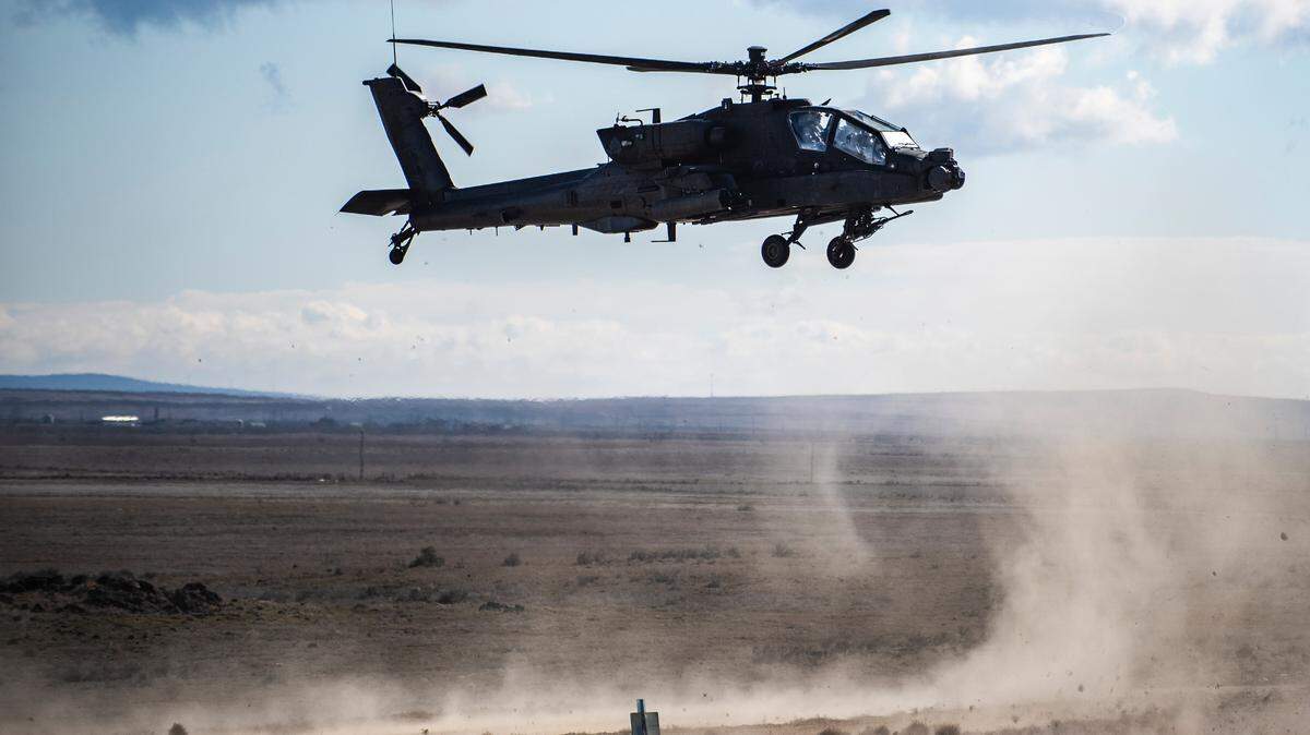 An AH-64 Apache helicopter takes part in a certification exercise at the Idaho National Guard’s Digital Air-Ground Integration Range at the Orchard Combat Training Center south of Boise.