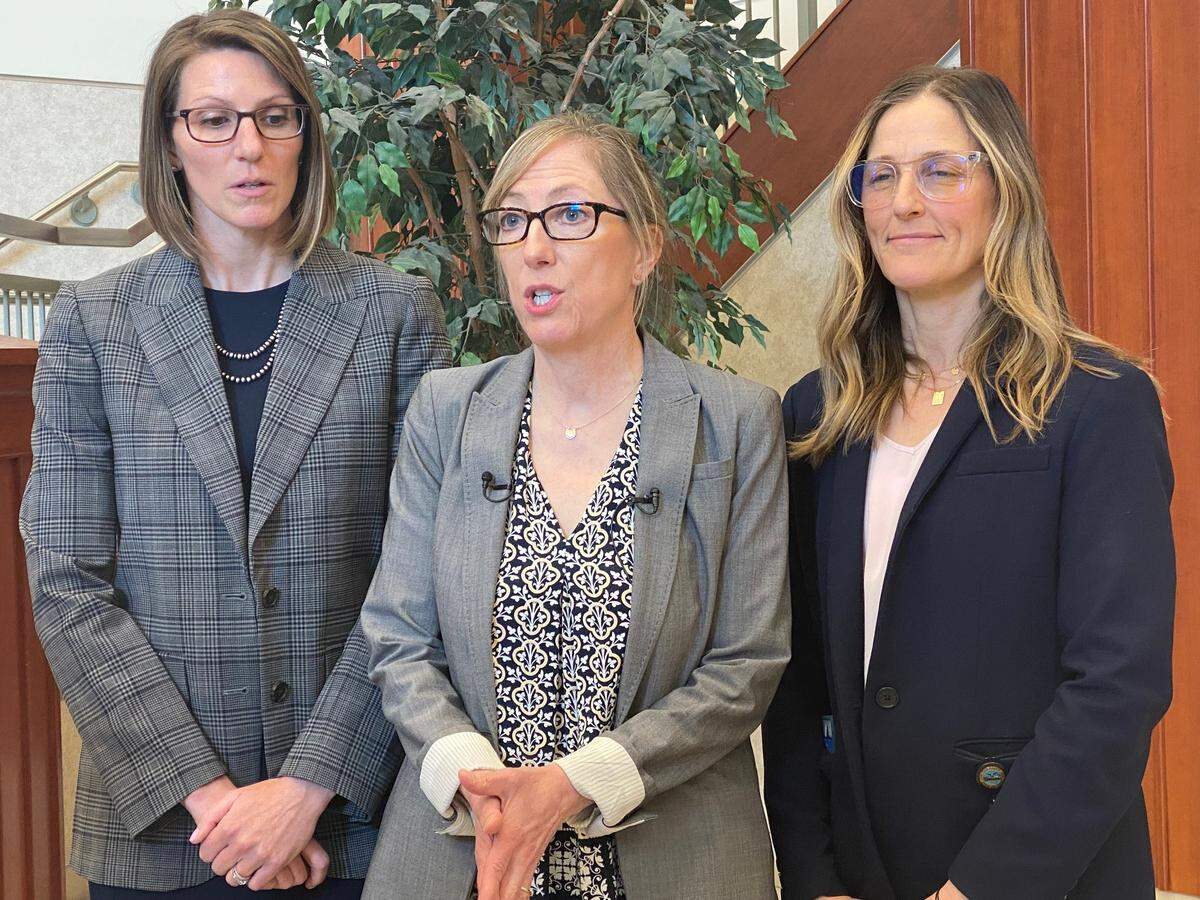Ada County Prosecutor Jan Bennetts, center, is the county’s highest-paid elected official.