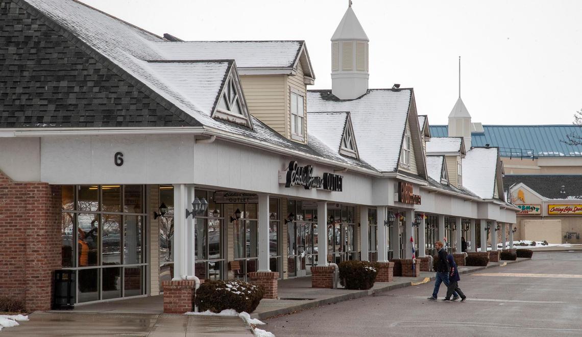 Patrons enter the Eddie Bauer factory outlet store Saturday at the Boise Outlets in East Boise.