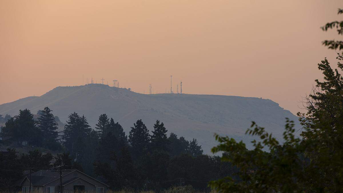 A smoky, pink sunrise came with reduced air quality in Boise on Friday, Sept. 9, 2022.