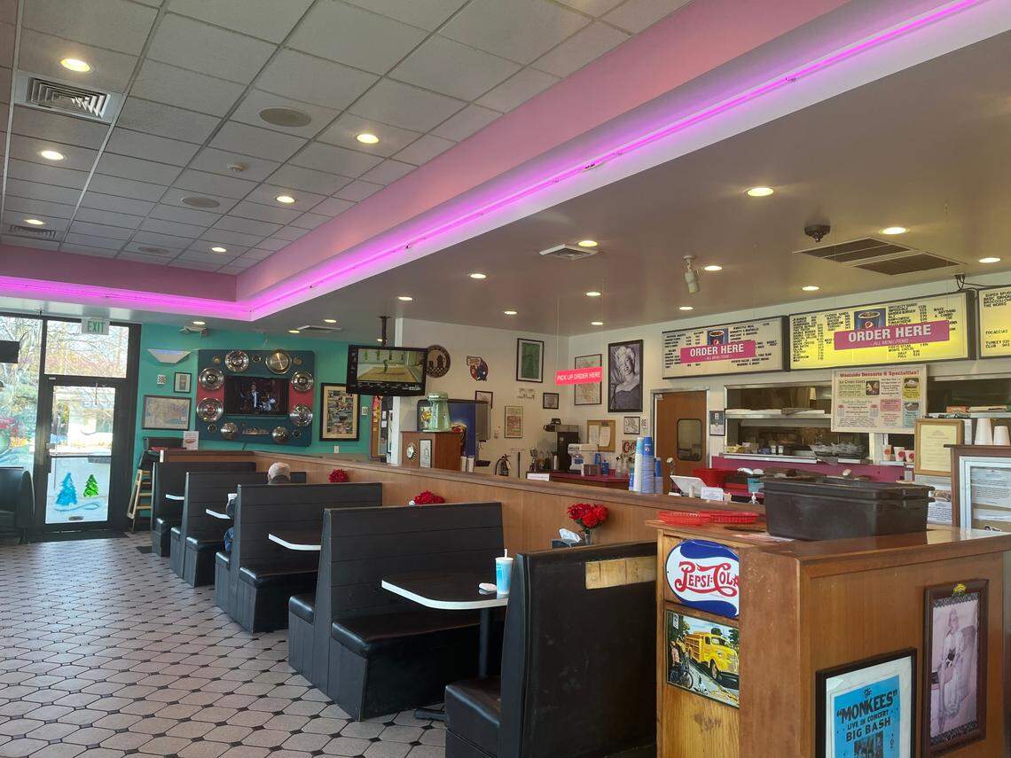 Westside Drive In was opened in 1957 and its decor reflects that, with pink neon lights and old-school menus on the wall.