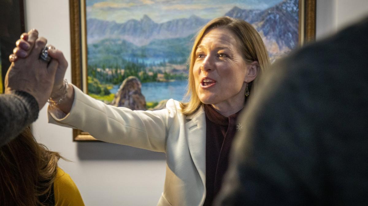 Boise’s new mayor-elect Lauren McLean gets a high five at her campaign party as the run-off election results come in her favor.