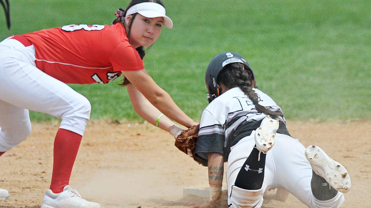 Boise High's Grace Shimatsu tags out a Highland High runner during their 5A softball state tournament first-round game Friday in Pocatello. Shimatsu scored the winning run for the Braves in their state championship victory against Eagle.