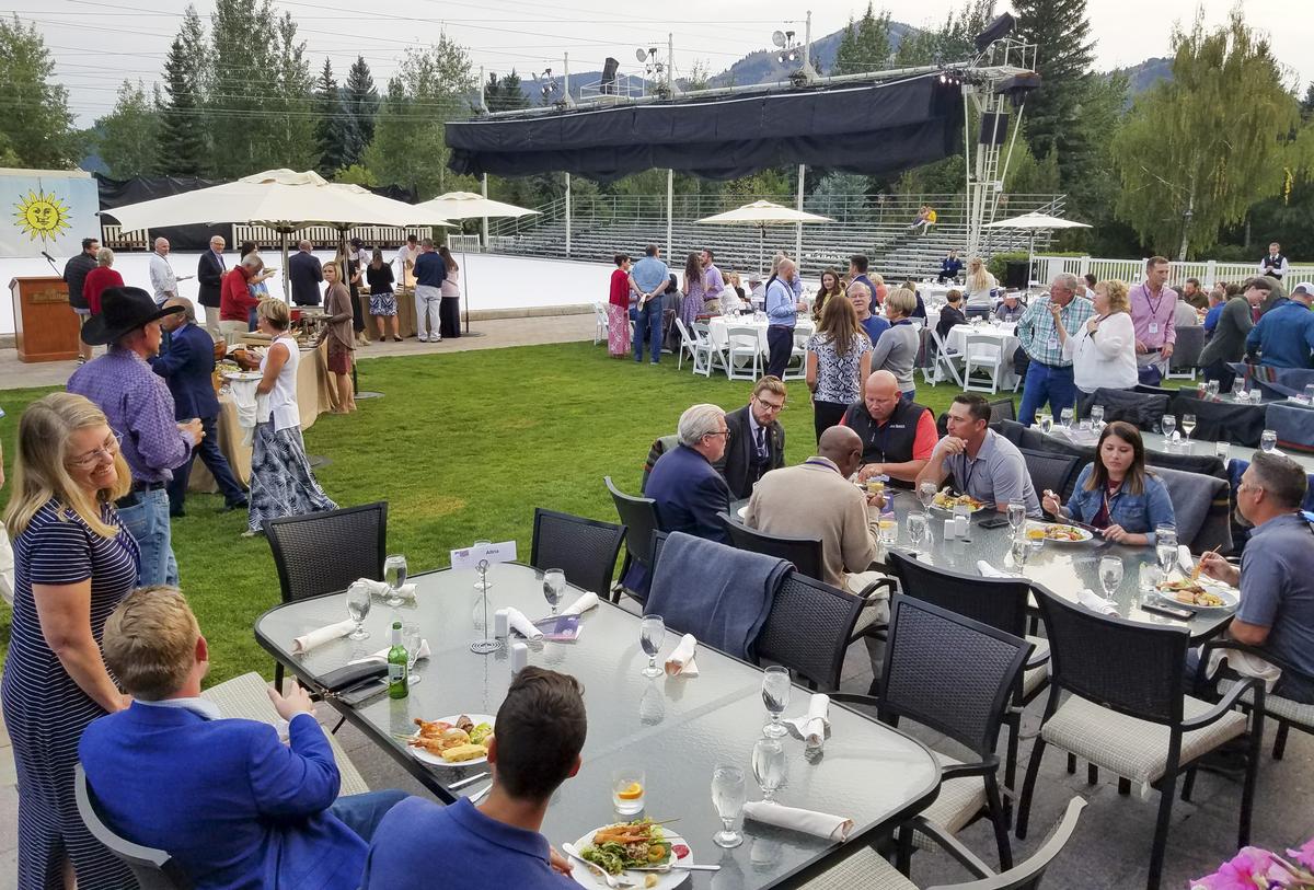 People who attended the 2019 Idaho Governor’s Cup mingled and dined outside the Sun Valley Lodge on a warm Saturday evening. The meal was followed by an ice show.