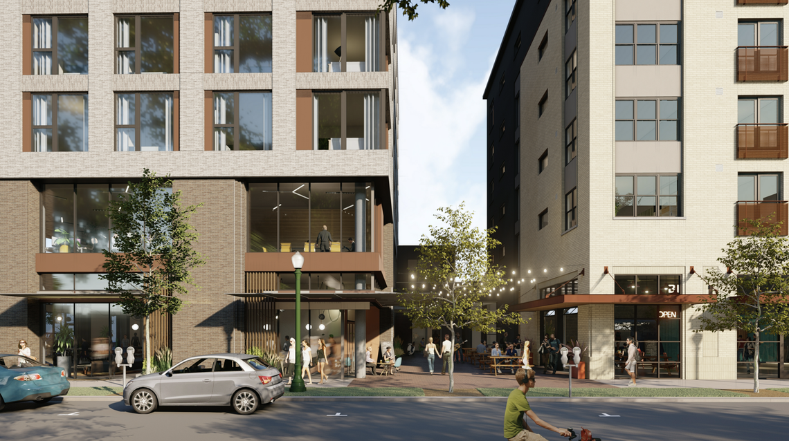 A team of Boise developers —&nbsp;Clay Carley of Old Boise, Chance Hobbs of VCD LLC, Dean Pape of deChase Miksis, and Bill Truax of the Galena Opportunity Fund —&nbsp;are working to bring two new apartment buildings to the current parking lot between 5th and 6th Streets facing Grove St. Here, an artist’s rendering of the courtyard between the seven-story building at Sixth and Grove, to the left, which would also include affordable housing, and the six-story apartment building at Fifth and Grove.