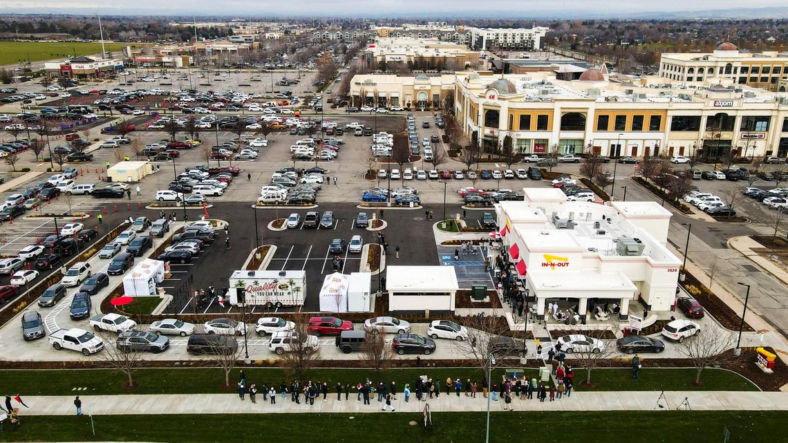 The line to get into the new In-N-Out, or navigate the drive-thru, turned into a long wait for fans of the fast-food hamburger chain. In-N-Out held an opening Tuesday at The Village at Meridian.