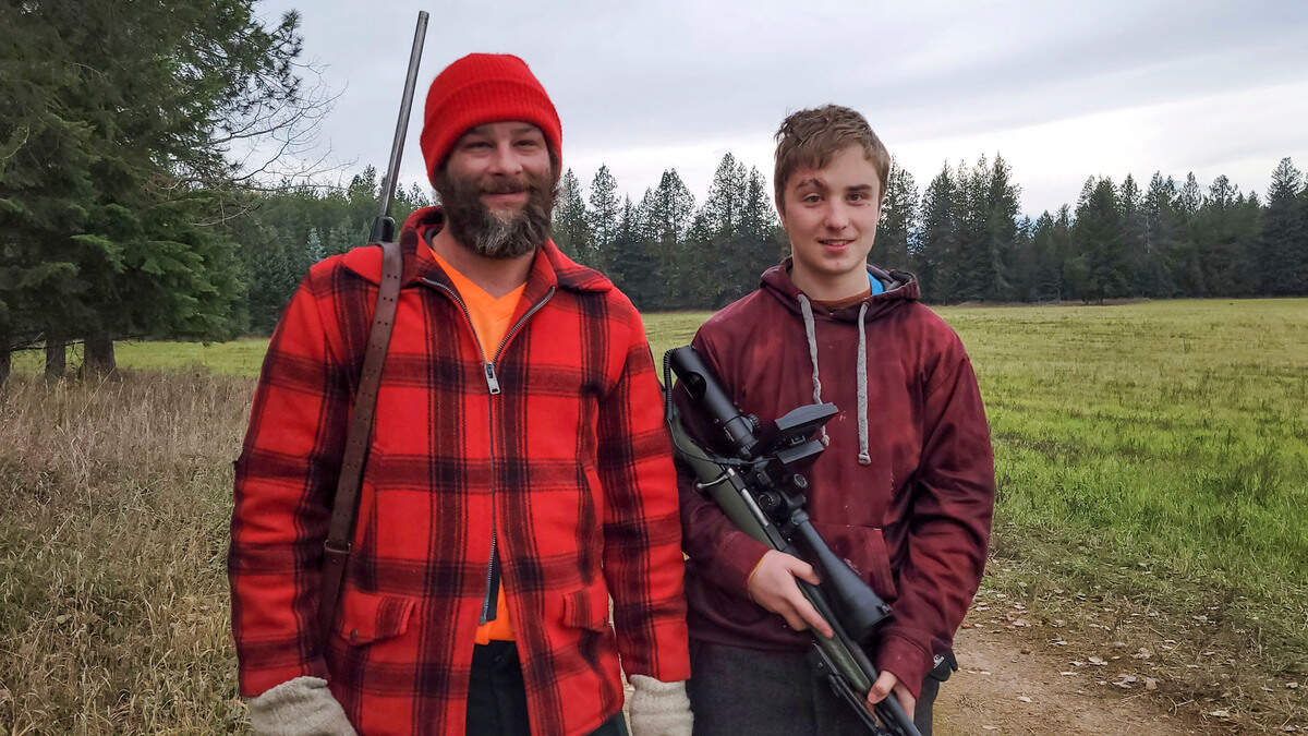 Jade Harlow, right, and his stepdad, Caleb Linck, used a scope camera with an external screen to harvest a white-tailed deer last fall before learning the technology was forbidden. Harlow is blind and his family says the technology makes hunting much safer, so they’re appealing to Idaho Department of Fish and Game for a rule change.