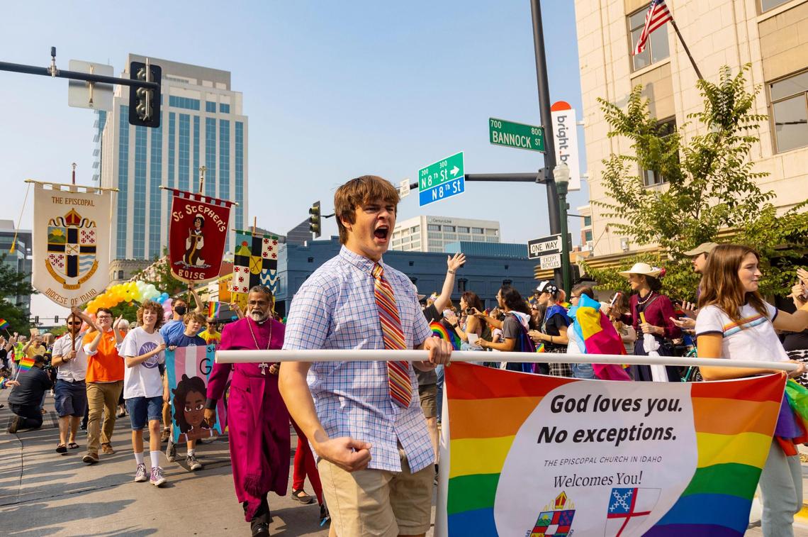 People from the Episcopal Church march in the Boise Pride Festival on Sunday, Sept, 11, 2022. The Fred Meyer Pride Parade circled through downtown Boise with nearly 70 entries ranging from small organizations walking to corporate floats.