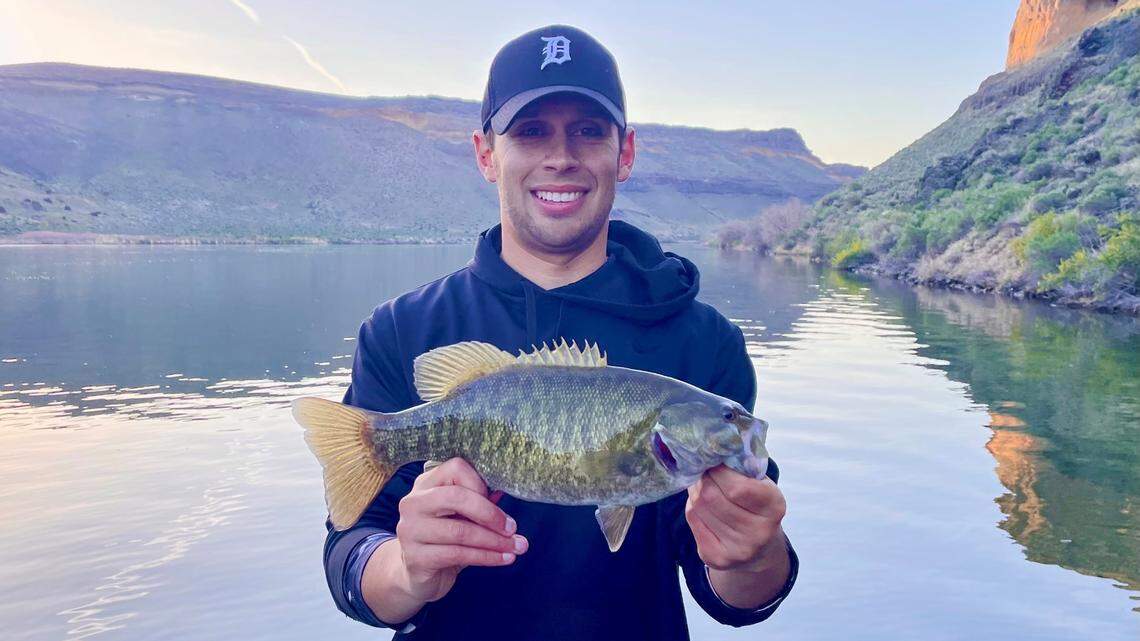 It’s important to handle bass — especially big ones — properly to avoid damaging their jaw. The safest way is the two-handed horizontal hold, with a thumb gripping the lower lip and a second hand supporting the weight of the fish near the tail.