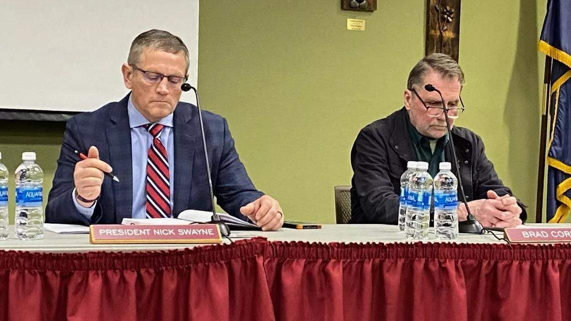 North Idaho College President Nick Swayne, left, and Trustee Brad Corkill, before Swayne was placed on administrative leave in December by a board dominated by members who think the community college is too liberal.