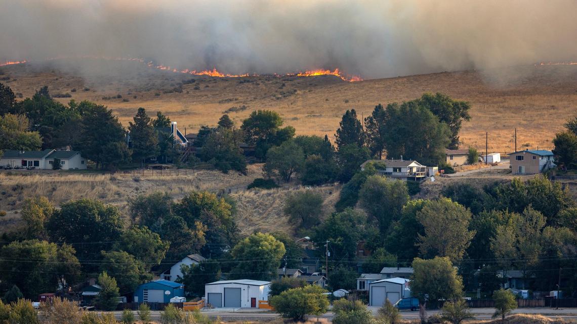 The Valley Fire burns Friday near subdivisions along Warm Springs Avenue in the Boise Foothills.