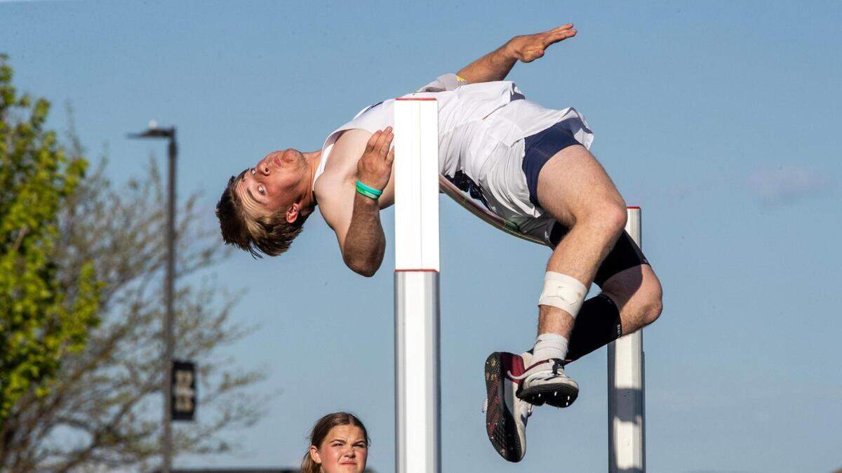 Timberline’s Alex Lowe takes second in high jump after clearing 22 feet, 2.75 inches at the 5A District Three track Friday at Kuna High.