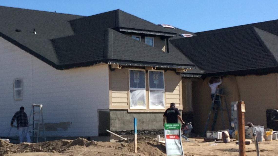 Construction workers put up houses in the Sienna Hills subdivision in Caldwell. After years of increasing home prices, Canyon County saw a slow decline last year. That is evident in the median decrease in Canyon County residential assessed values.
