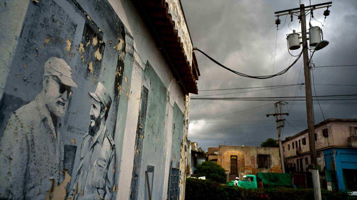 A mural featuring Fidel Castro shaking hands with American author Ernest Hemingway, left, at a parking lot in Havana, Cuba. Idaho scholar Marty Peterson and Sen. John McCain were Hemingway fans, and Peterson got McCain’s help preserving Hemingway’s Cuban estate.