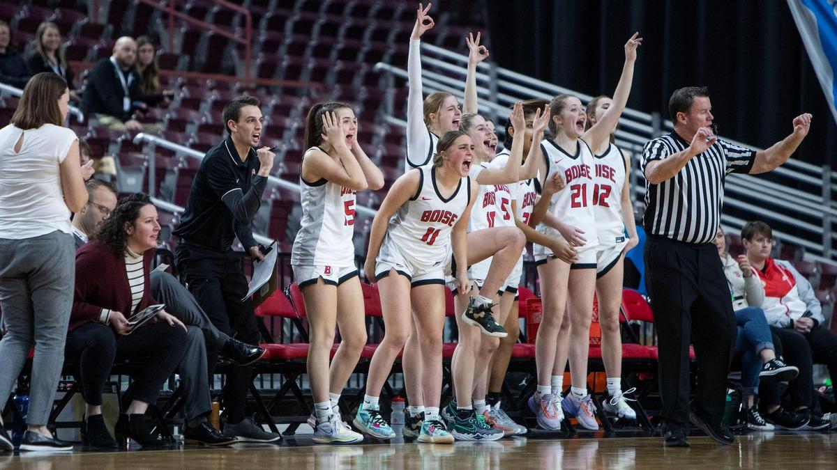Boise’s bench cheers after a teammate sinks a 3-pointer Thursday.