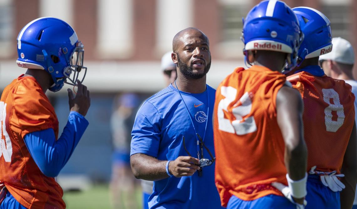 Boise State cornerbacks coach Jalil Brown works with his players on the first day of fall camp Friday, Aug. 2, 2019.