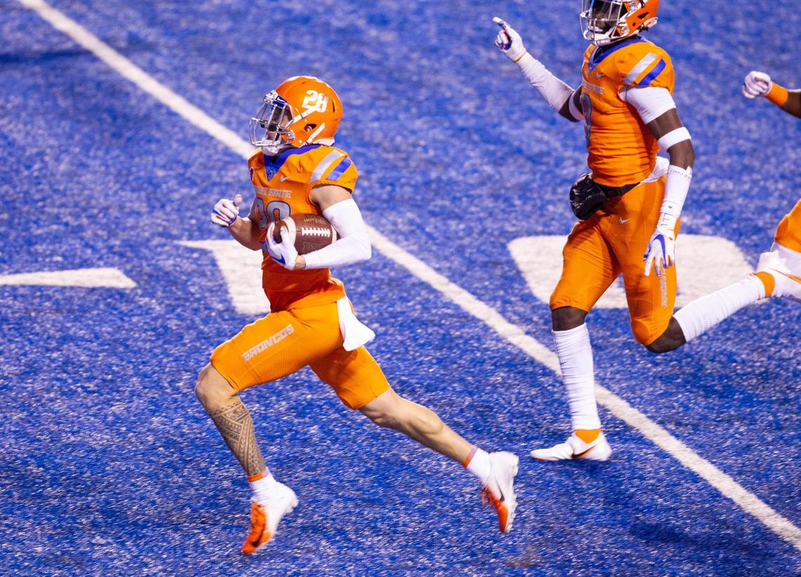 Boise State nickel Kekaula Kaniho (28) returns a blocked field goal 91 yards for a touchdown during the game against Colorado State University at Albertsons Stadium. Boise State defeated CSU 52-21 Thursday, Nov. 12, 2020.