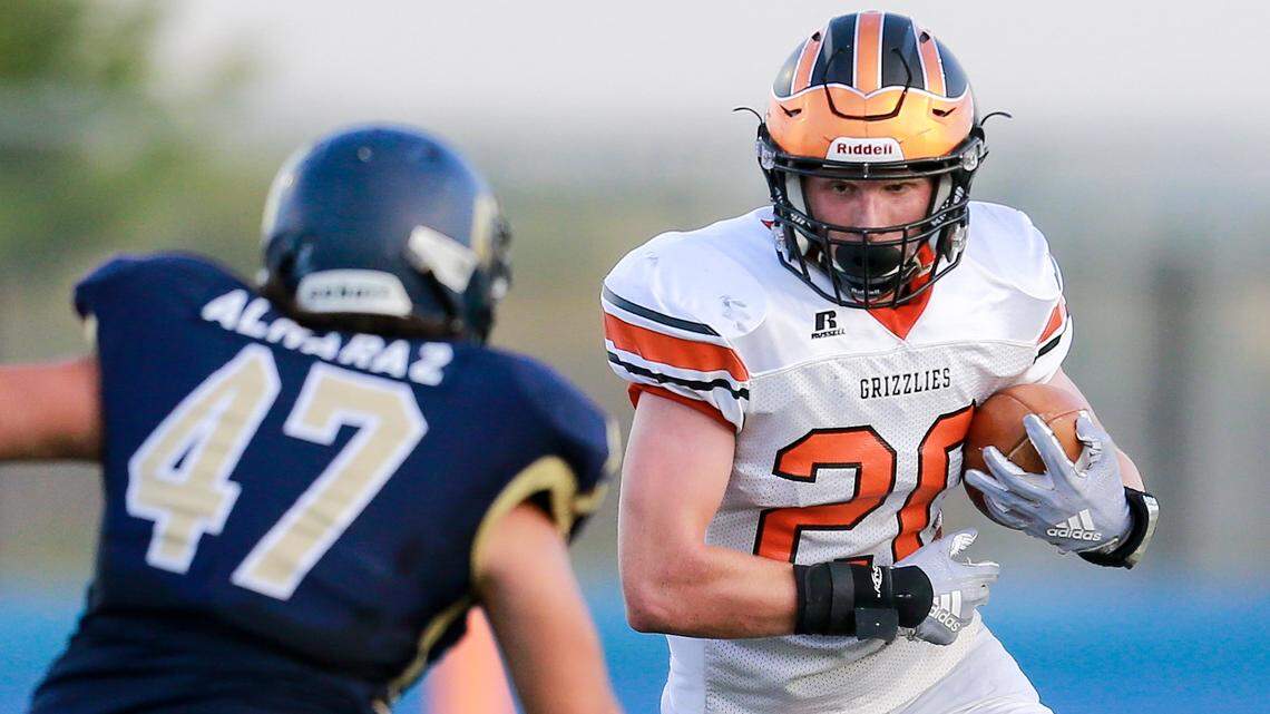 Fruitland’s Noah Hattrup (20) searches for running room against Middleton on Sept. 14.