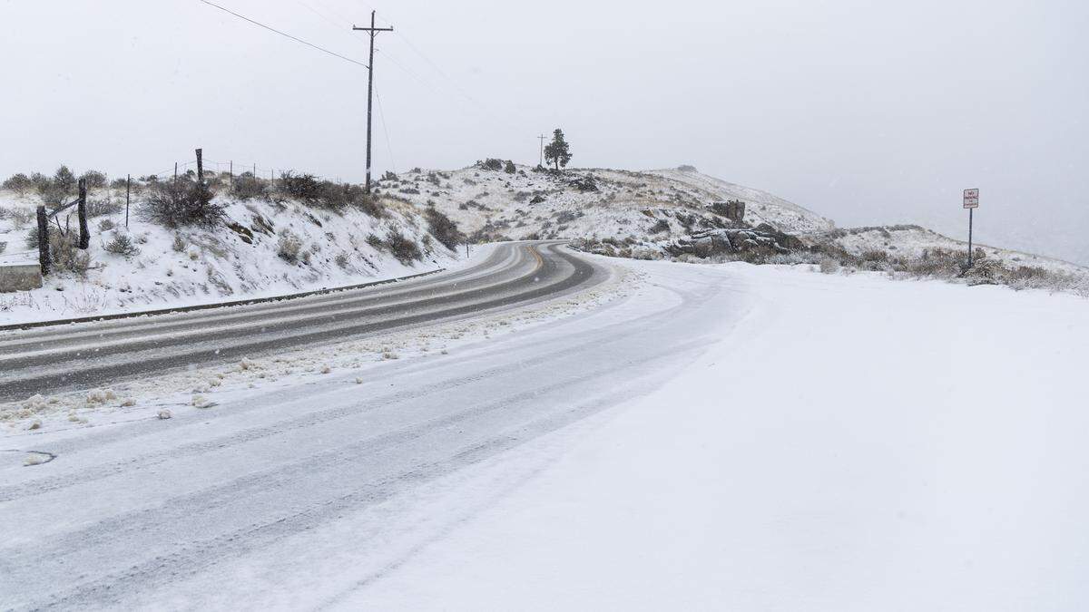 Snow falls along Bogus Basin Road in Boise, Dec. 18, 2025.