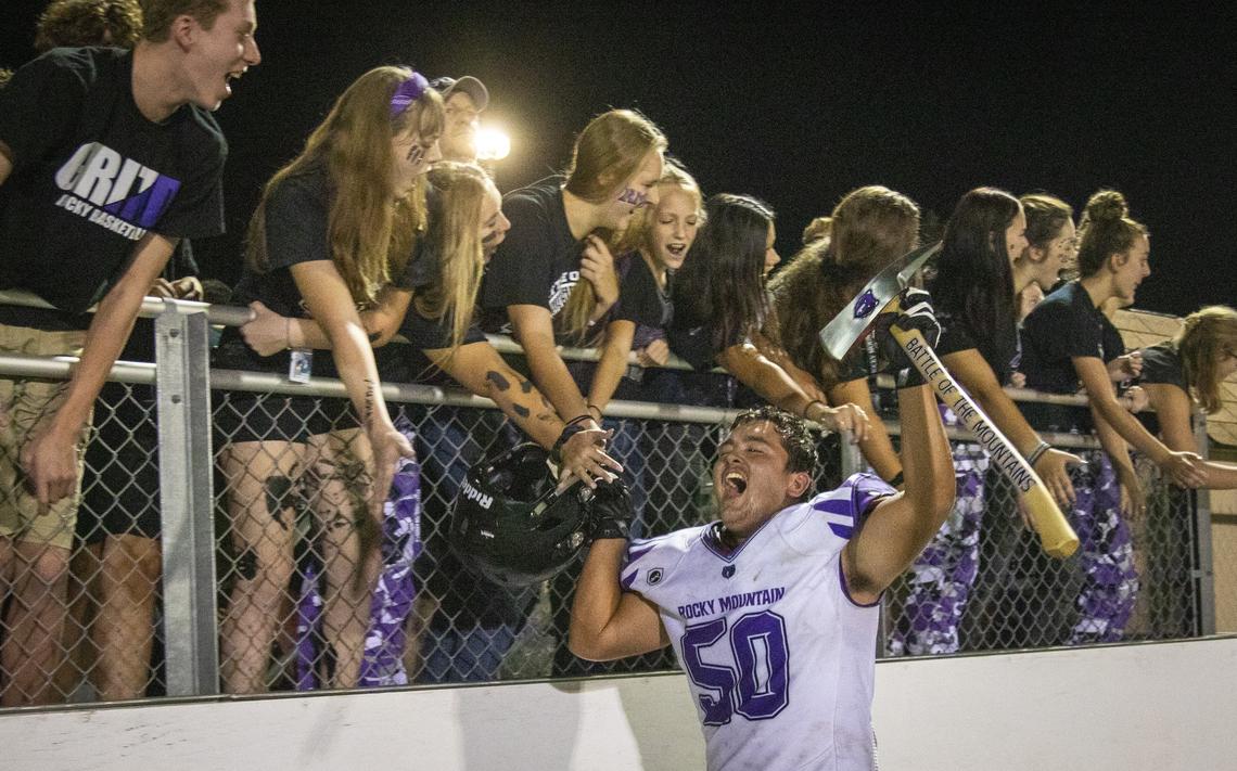 Rocky Mountain’s Devon Long carries the Battle of the Mountains trophy. No. 1 Rocky Mountain defeated No. 2 Mountain View 27-7 in the annual Battle of the Mountains football rivalry on Friday, Sept. 6, 2019.
