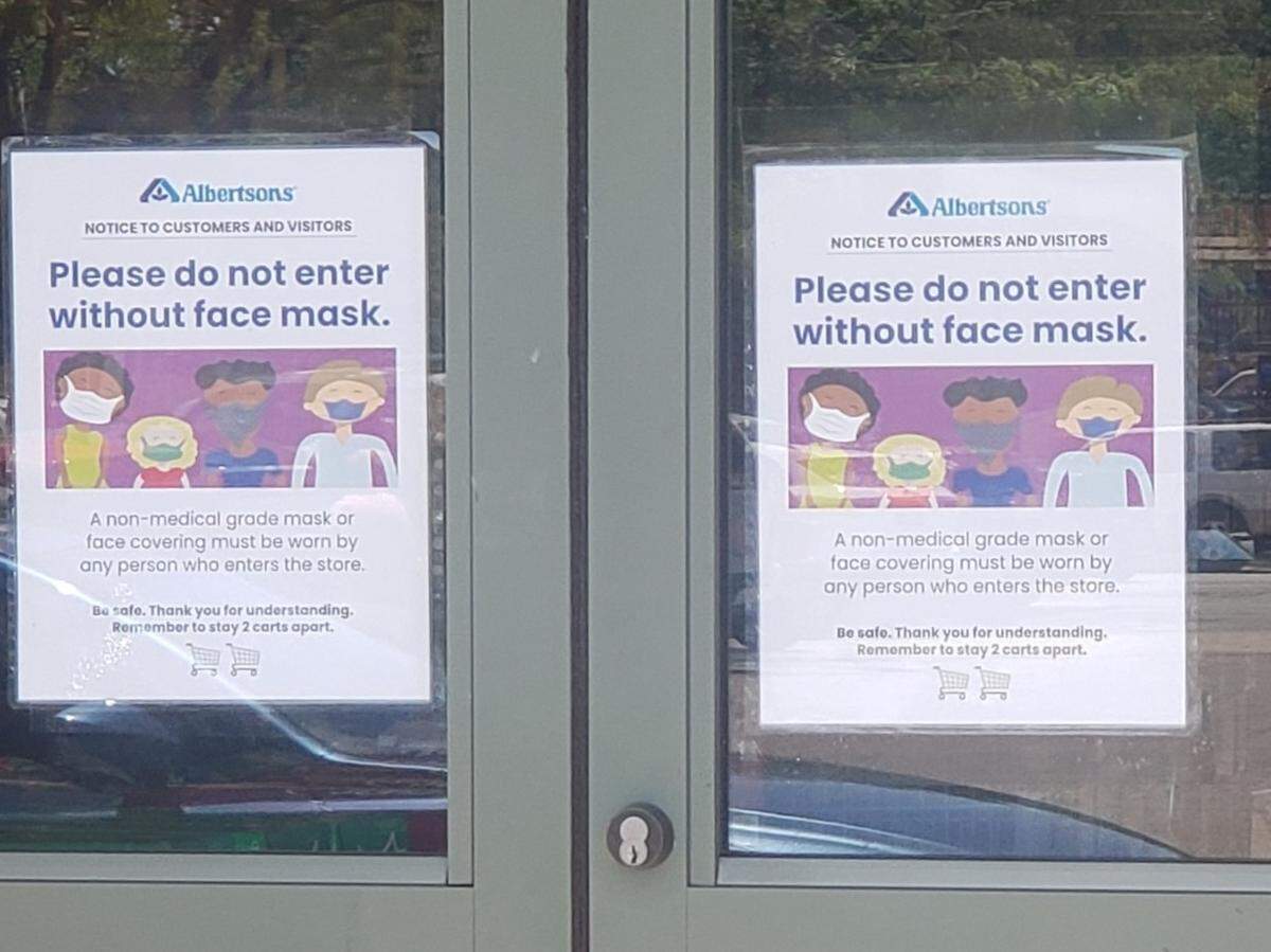 At the Albertsons grocery store at 16th and State streets in Boise, signs on two sets of entry doors tell customers in July not to enter the if they don’t have face mask. “A non-medical-grade mask or face covering must be worn by any person who enters the store,” the sign says.