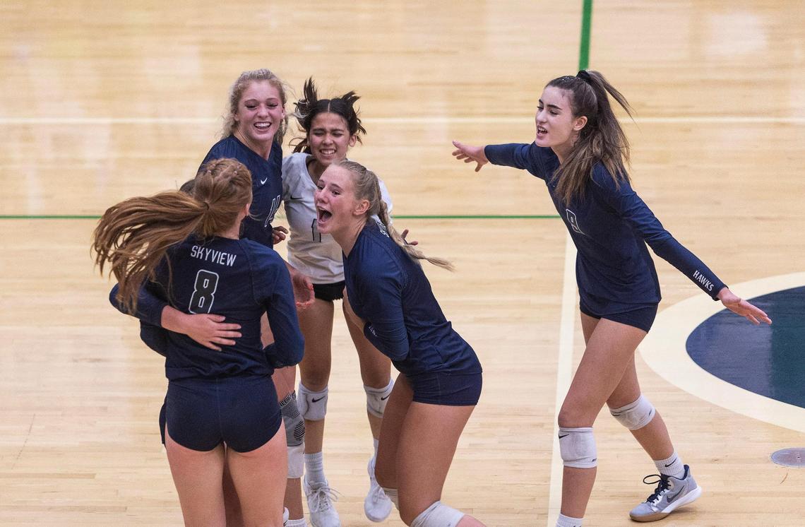 Skyview players celebrate a point during their game against Mountain View in Meridian on Thursday.