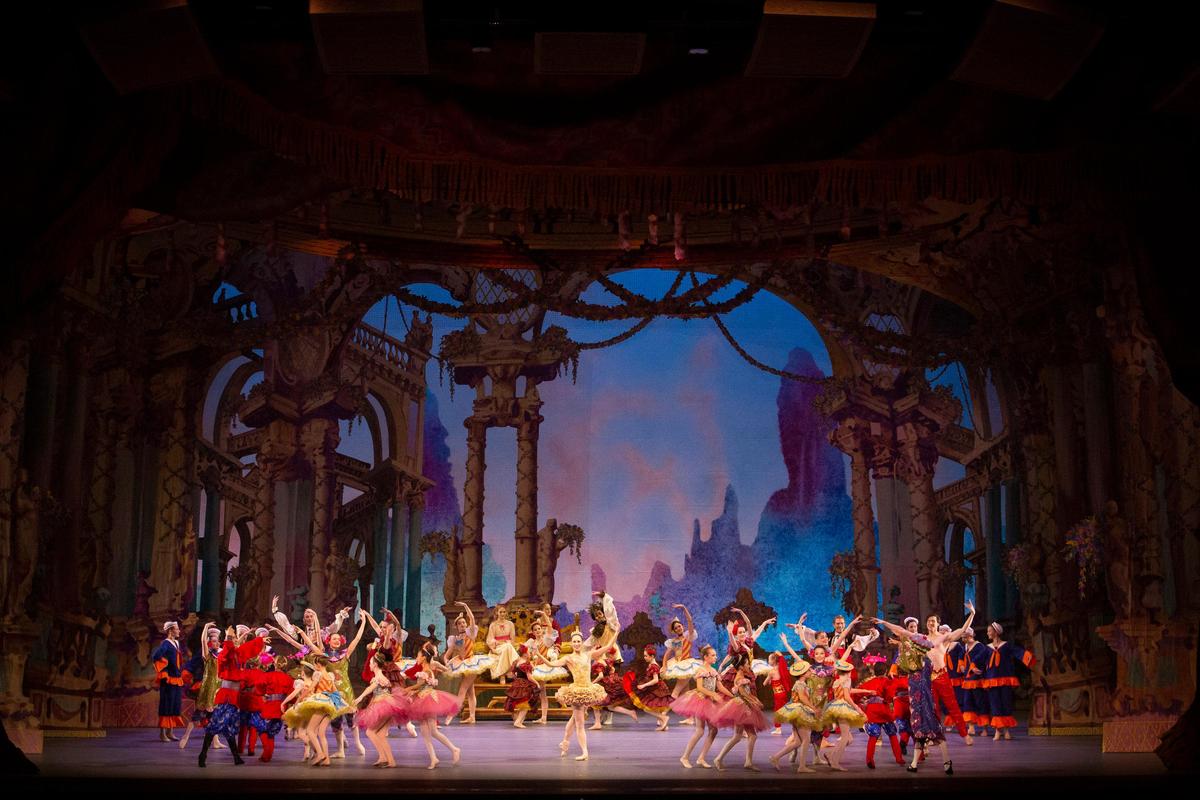 Jessica Suilkowski takes center stage for a moment during the final coda of Ballet Idaho’s new “Nutcracker” production. The set is designed by Christopher McCollom and costumes by Margaret A. Mitchell.