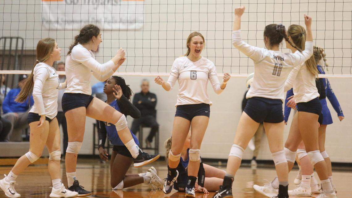 Skyview’s Rachel Thuernagle (6) celebrates a point with her teammates in the Idaho 5A state volleyball championship game against Thunder Ridge Saturday in Post Falls.