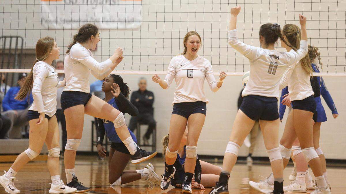 Skyview’s Rachel Thuernagle (6) celebrates a point with her teammates in the Idaho 5A state volleyball championship game against Thunder Ridge Saturday in Post Falls.