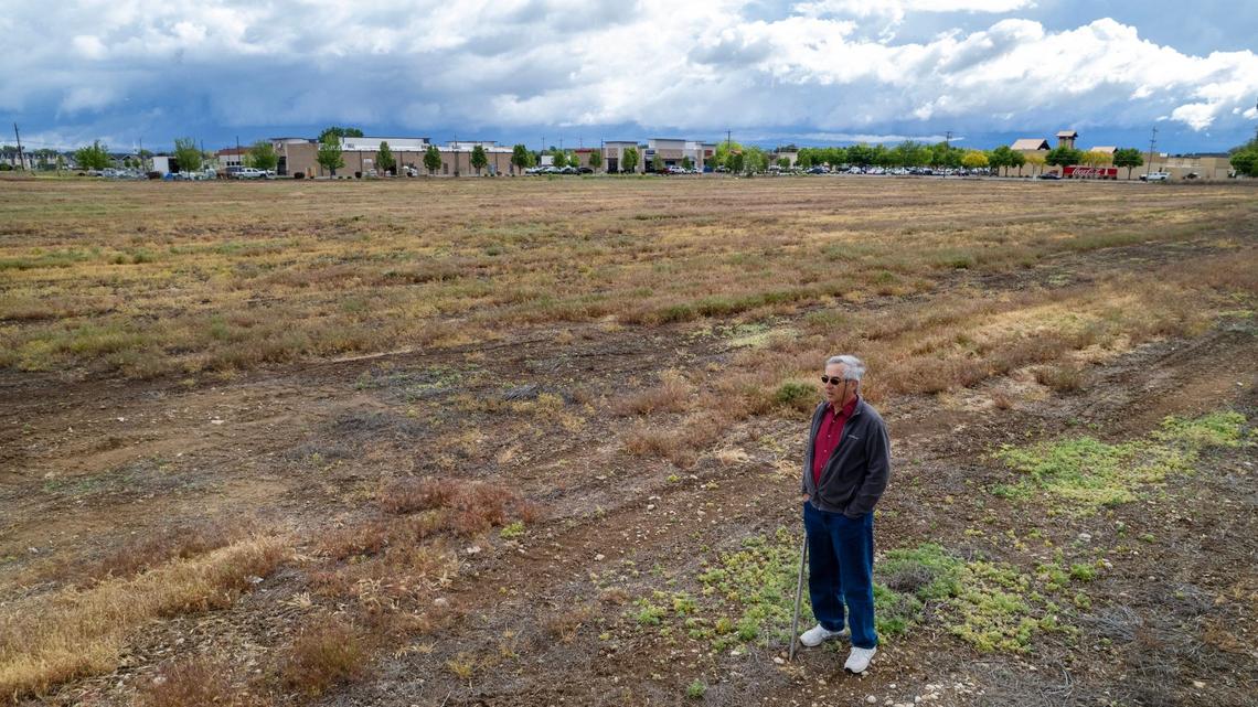 Carlos Vidales stands in the 10-acre lot that the Ada County Commission refused to rezone. Vidales and other residents of the Lake Hazel Village neighborhood want to see the lot stay zoned for commercial and bring more businesses to the mostly residential area in Southwest Boise.