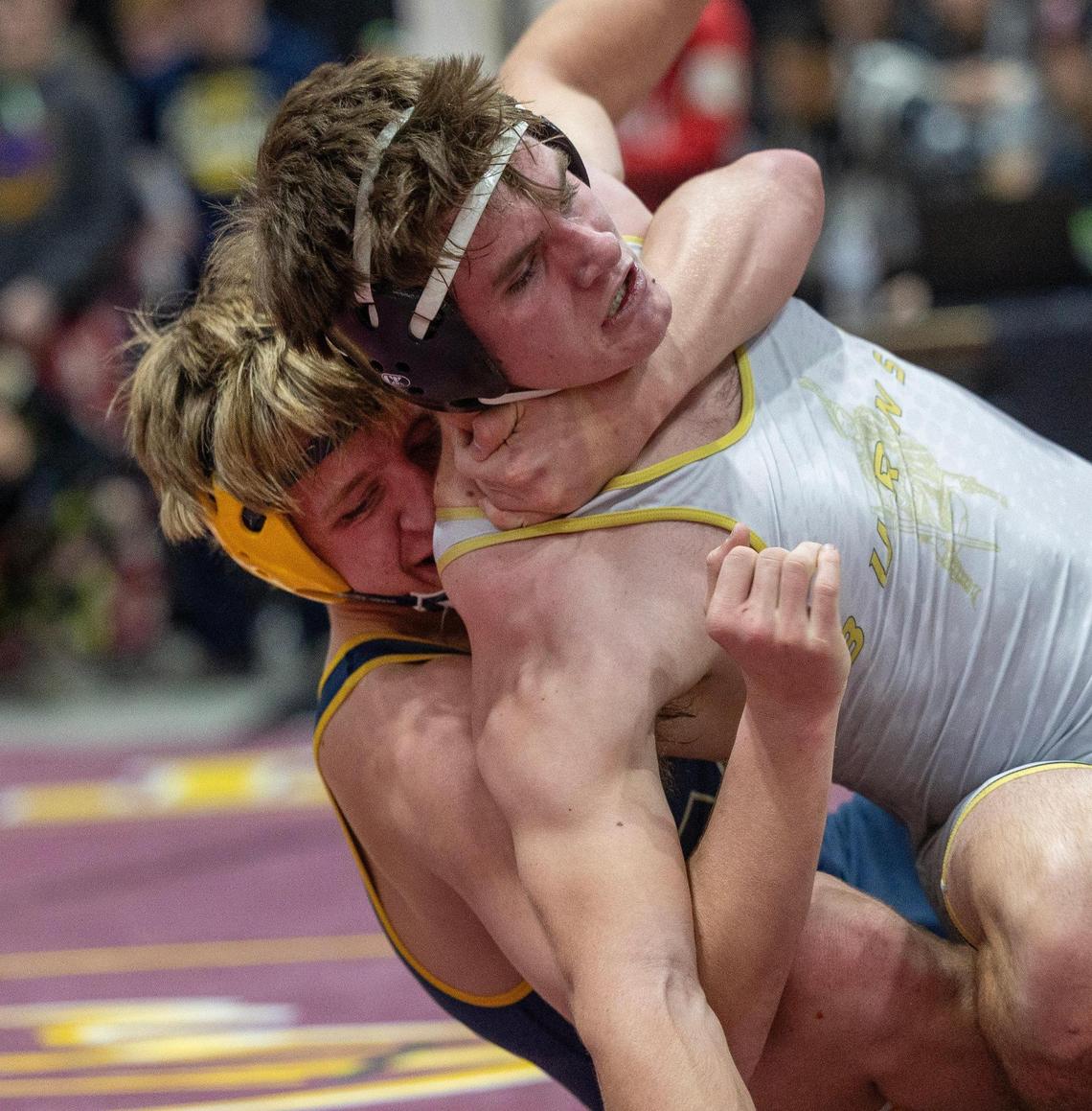 Meridian’s Hudson Rogers takes down Burns’ Easton Kemper in the 182-pound championship Saturday at the Rollie Lane Invitational at the Ford Idaho Center in Nampa.