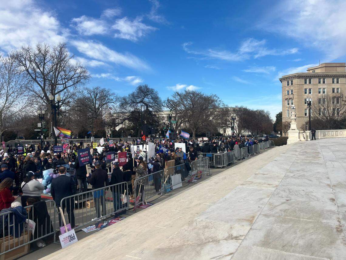Protesters gather outside the U.S. Supreme Court on the day Idaho’s transgender sports law was being debated.