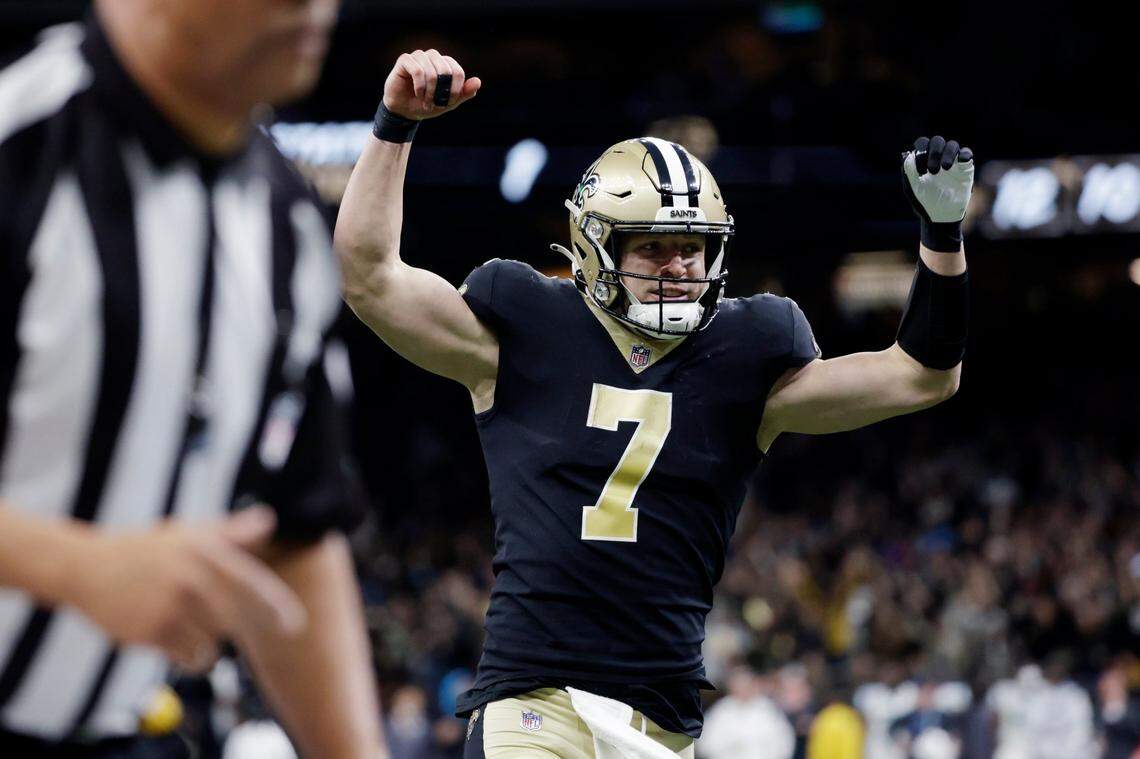 New Orleans Saints quarterback Taysom Hill celebrates his touchdown pass in the fourth quarter against the Carolina Panthers on Sunday in New Orleans.